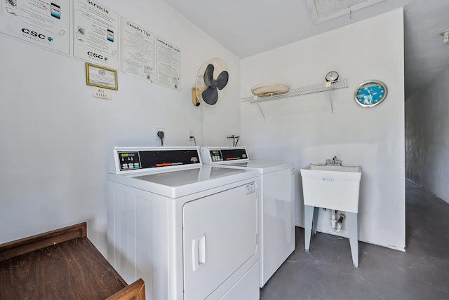 clothes washing area featuring washing machine and clothes dryer