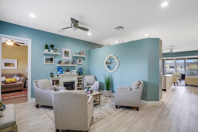 living room with light hardwood / wood-style floors