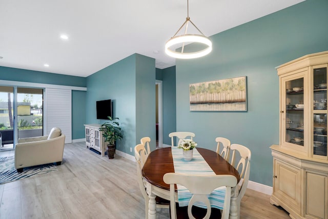 dining room with light wood-type flooring