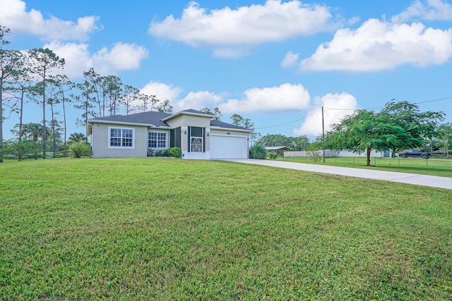 ranch-style house featuring a front yard and a garage