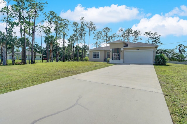 view of front of property featuring a front yard and a garage