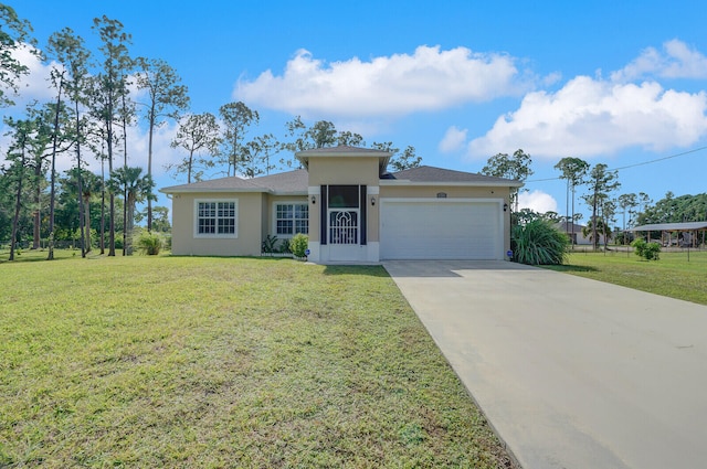 view of front of house with a front yard and a garage