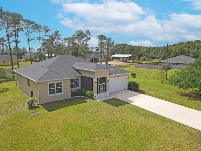 ranch-style house with a garage and a front lawn