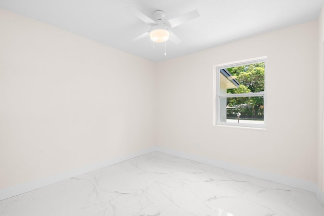 spare room featuring ceiling fan