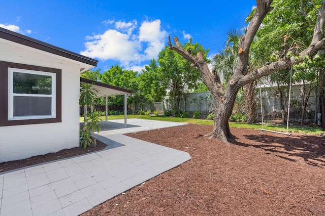 view of yard with a patio area