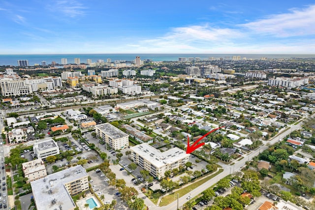 birds eye view of property featuring a water view