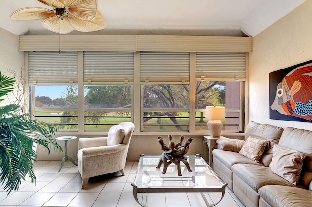 sunroom / solarium featuring vaulted ceiling and ceiling fan