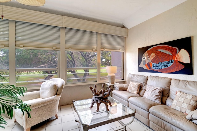 tiled living room with lofted ceiling