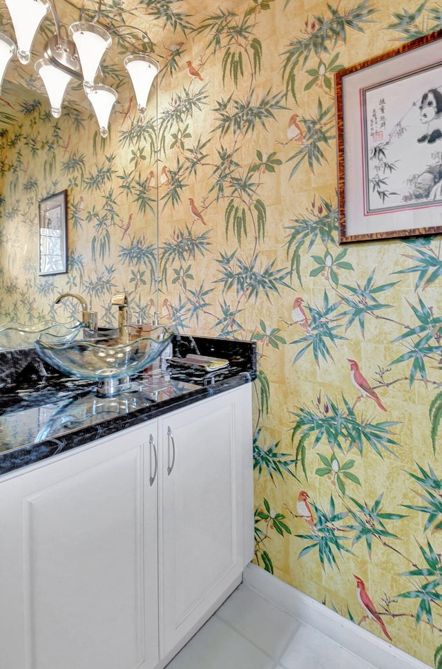 bathroom with vanity and tile patterned flooring