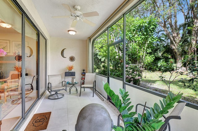 sunroom / solarium with ceiling fan