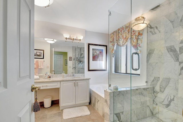 bathroom with vanity, shower with separate bathtub, and tile patterned floors