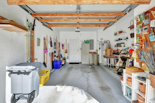 garage featuring electric panel and water heater