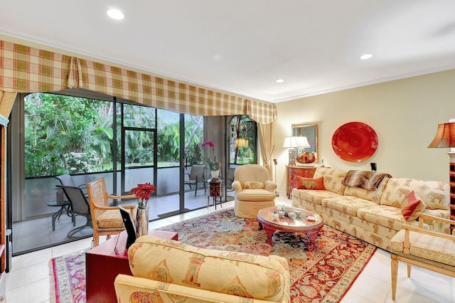 living room featuring ornamental molding and tile patterned floors