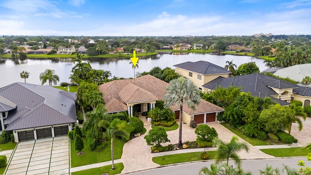 birds eye view of property featuring a water view