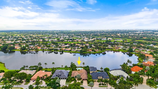 drone / aerial view with a water view