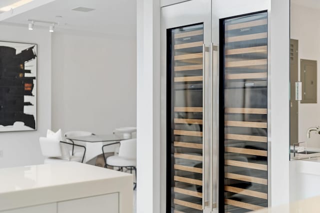 interior space featuring wine cooler and sink