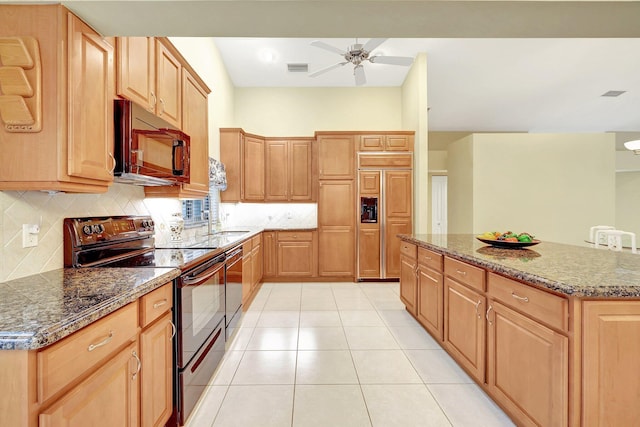 kitchen with light tile patterned floors, ceiling fan, tasteful backsplash, black appliances, and dark stone counters