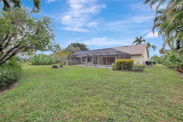 view of yard featuring a lanai