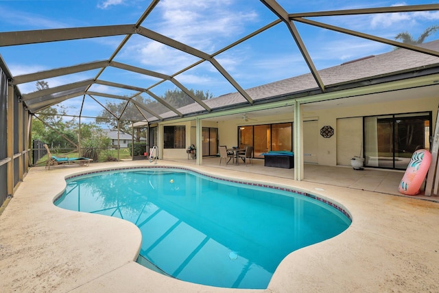 view of pool featuring a patio and a lanai