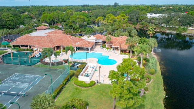 birds eye view of property featuring a water view