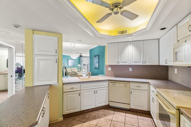 9500 S Ocean Dr Unit 1909, Jensen Beach, FL 34957 - kitchen featuring white appliances, ceiling fan, a sink, crown molding, and decorative backsplash