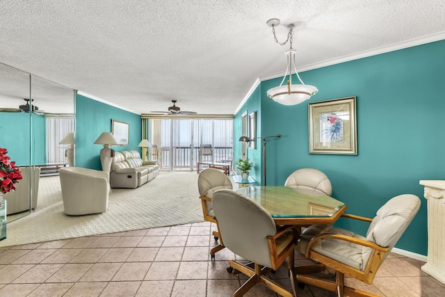 9500 S Ocean Dr Unit 1909, Jensen Beach, FL 34957 - dining room featuring crown molding, ceiling fan, a textured ceiling, and baseboards