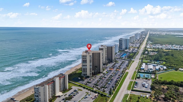 bird's eye view with a view of the beach and a water view