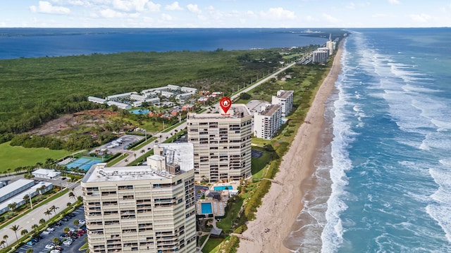 aerial view featuring a water view and a view of the beach