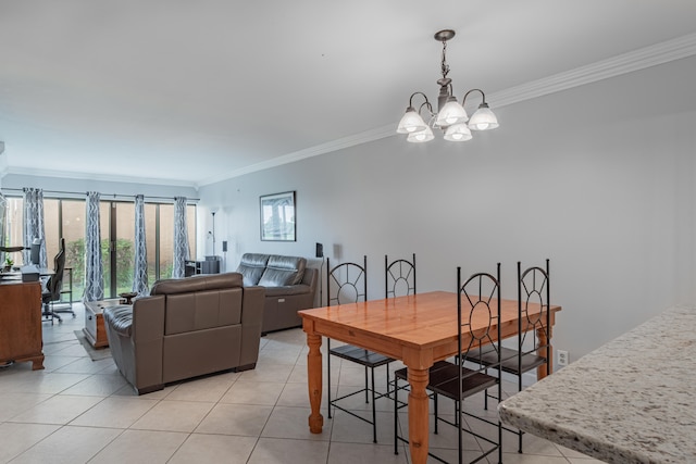 tiled dining space with an inviting chandelier and ornamental molding