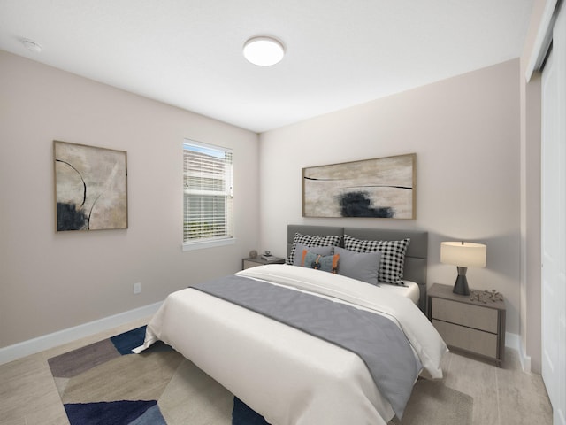 bedroom featuring light wood-type flooring