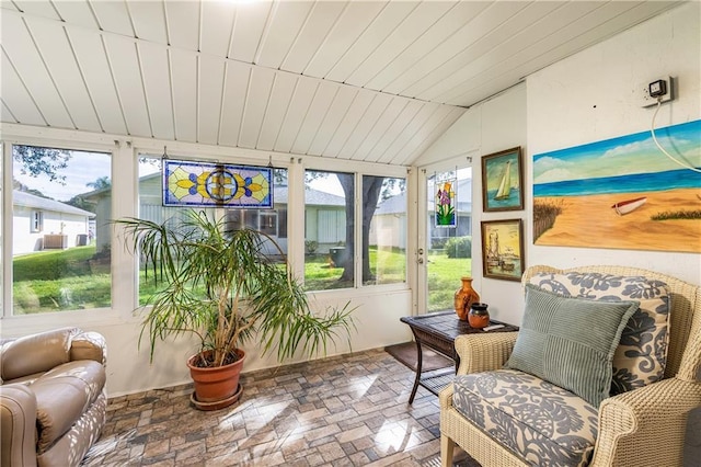 sunroom / solarium with wooden ceiling and lofted ceiling