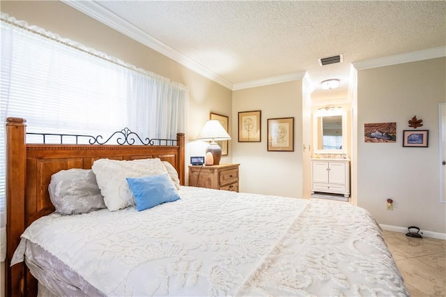 tiled bedroom featuring connected bathroom, ornamental molding, and a textured ceiling