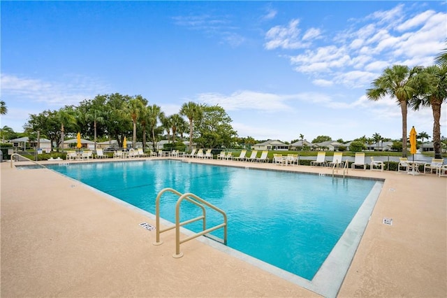 view of pool featuring a patio