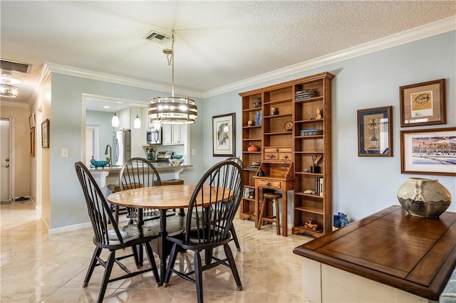 dining area featuring a notable chandelier, a textured ceiling, and ornamental molding