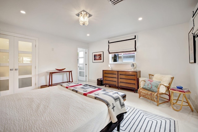 bedroom featuring french doors and multiple windows