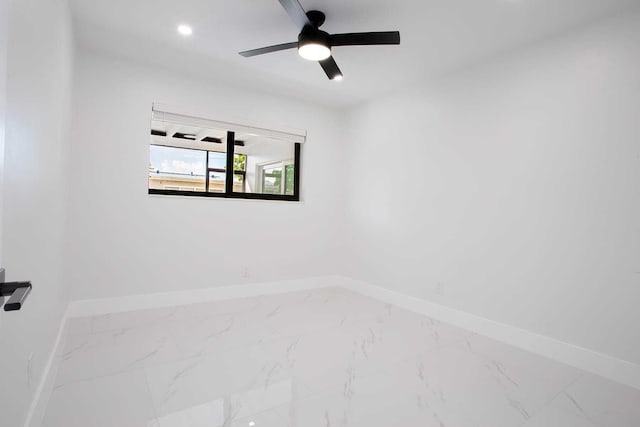 unfurnished room with ceiling fan