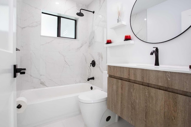 full bathroom featuring vanity, toilet, and tiled shower / bath combo