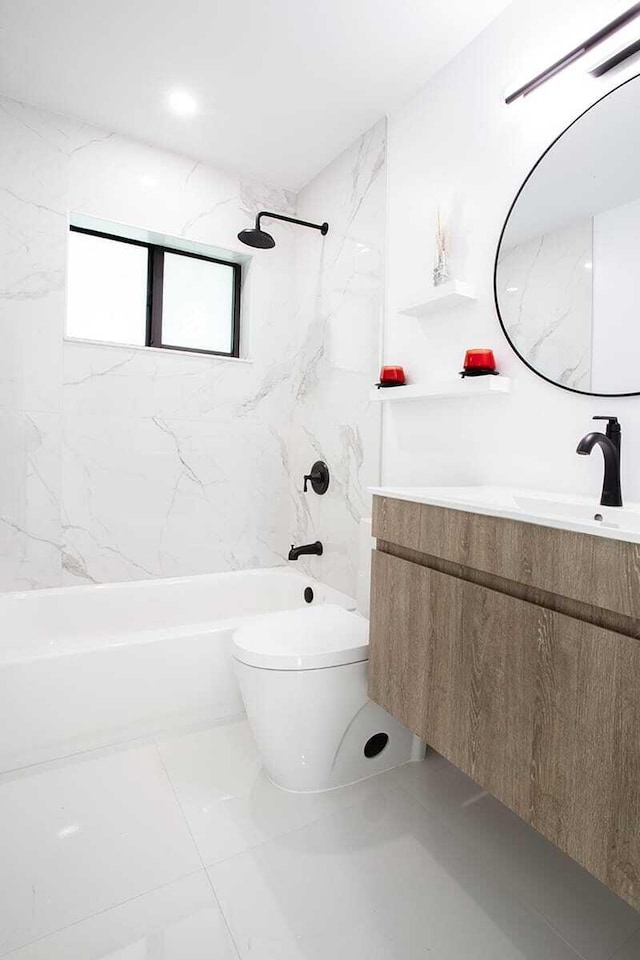 full bathroom with vanity, toilet, tile patterned flooring, and tiled shower / bath