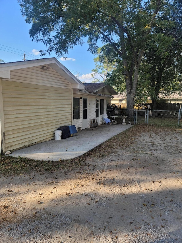 rear view of house with a patio area