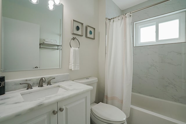 full bathroom featuring vanity, toilet, and shower / tub combo