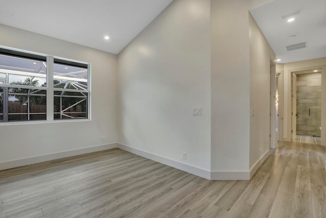 empty room featuring light hardwood / wood-style floors