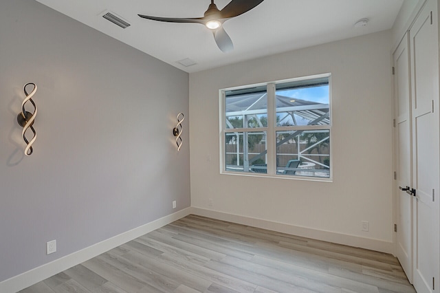 unfurnished bedroom featuring light hardwood / wood-style floors and ceiling fan