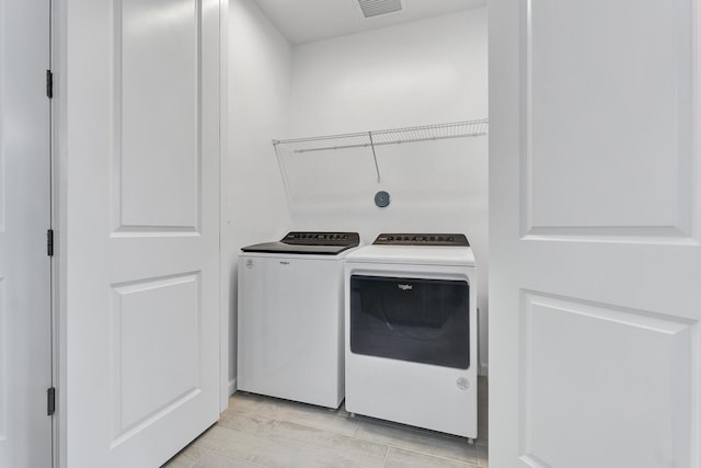 laundry room featuring washer and dryer