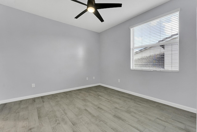 unfurnished room with ceiling fan and light hardwood / wood-style flooring