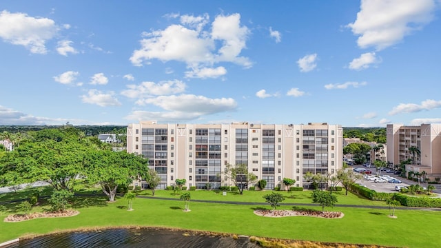 view of building exterior with a water view