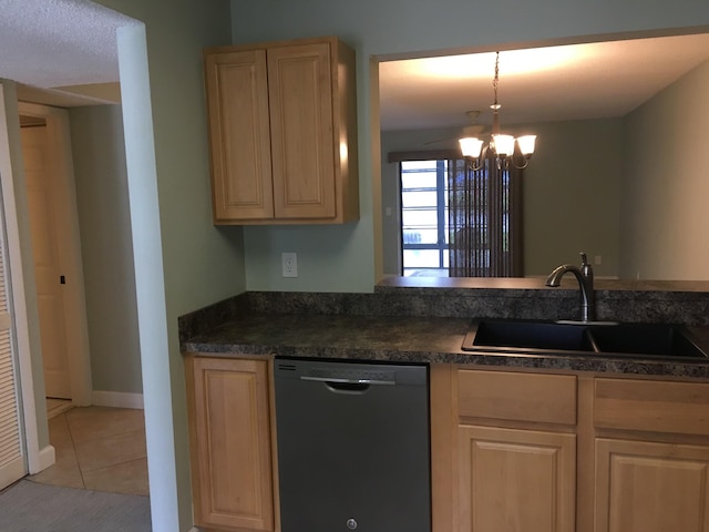 kitchen featuring sink, light tile patterned floors, a chandelier, black dishwasher, and hanging light fixtures