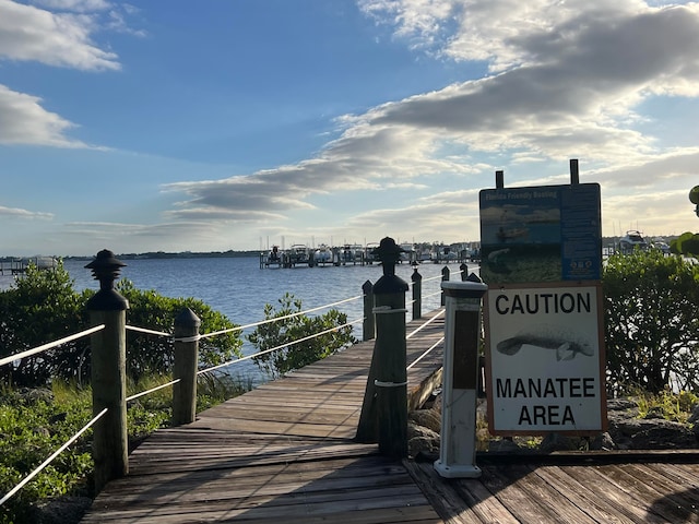 view of dock with a water view