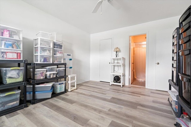 interior space featuring ceiling fan