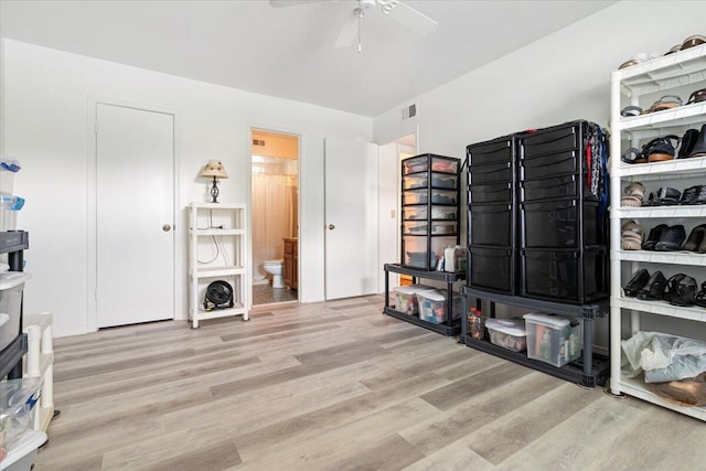 misc room featuring ceiling fan and light hardwood / wood-style flooring