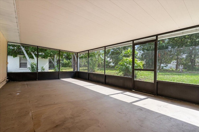 unfurnished sunroom with a wealth of natural light